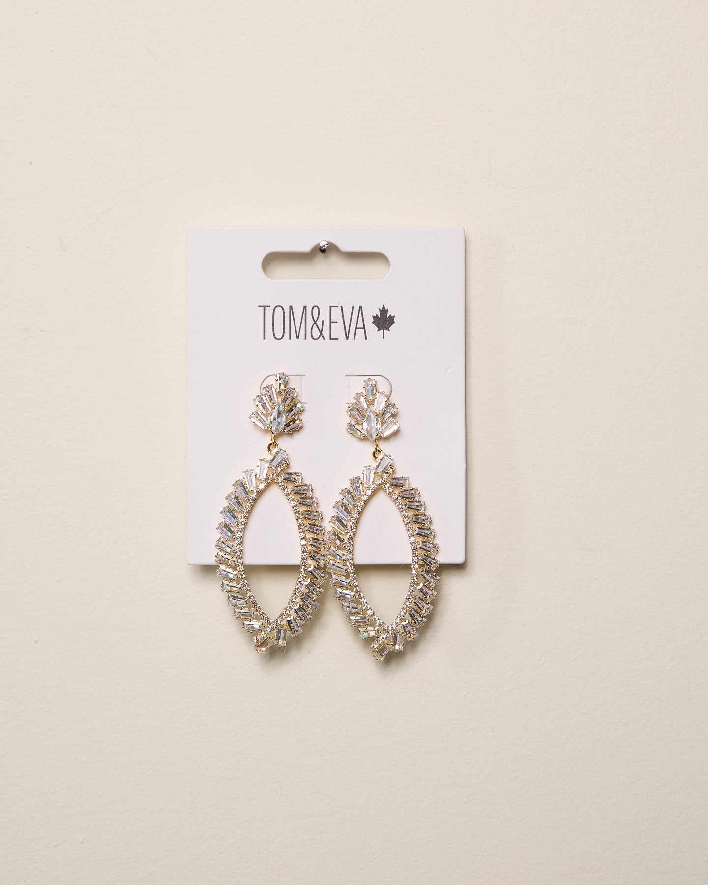 Boucles d’oreilles pendantes ovales avec strass dorées