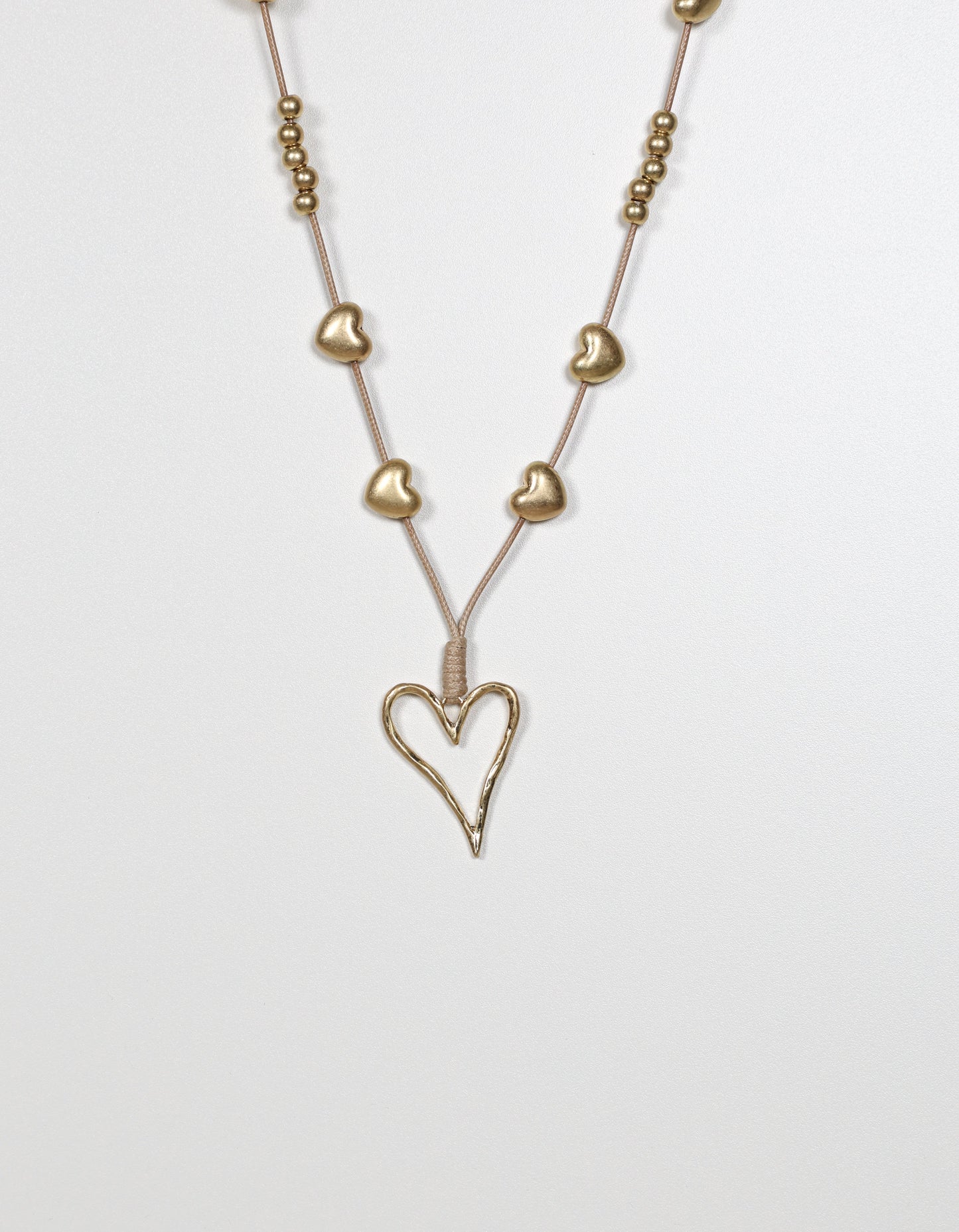 Gold Cord Necklace with Layered Heart and Ball Details