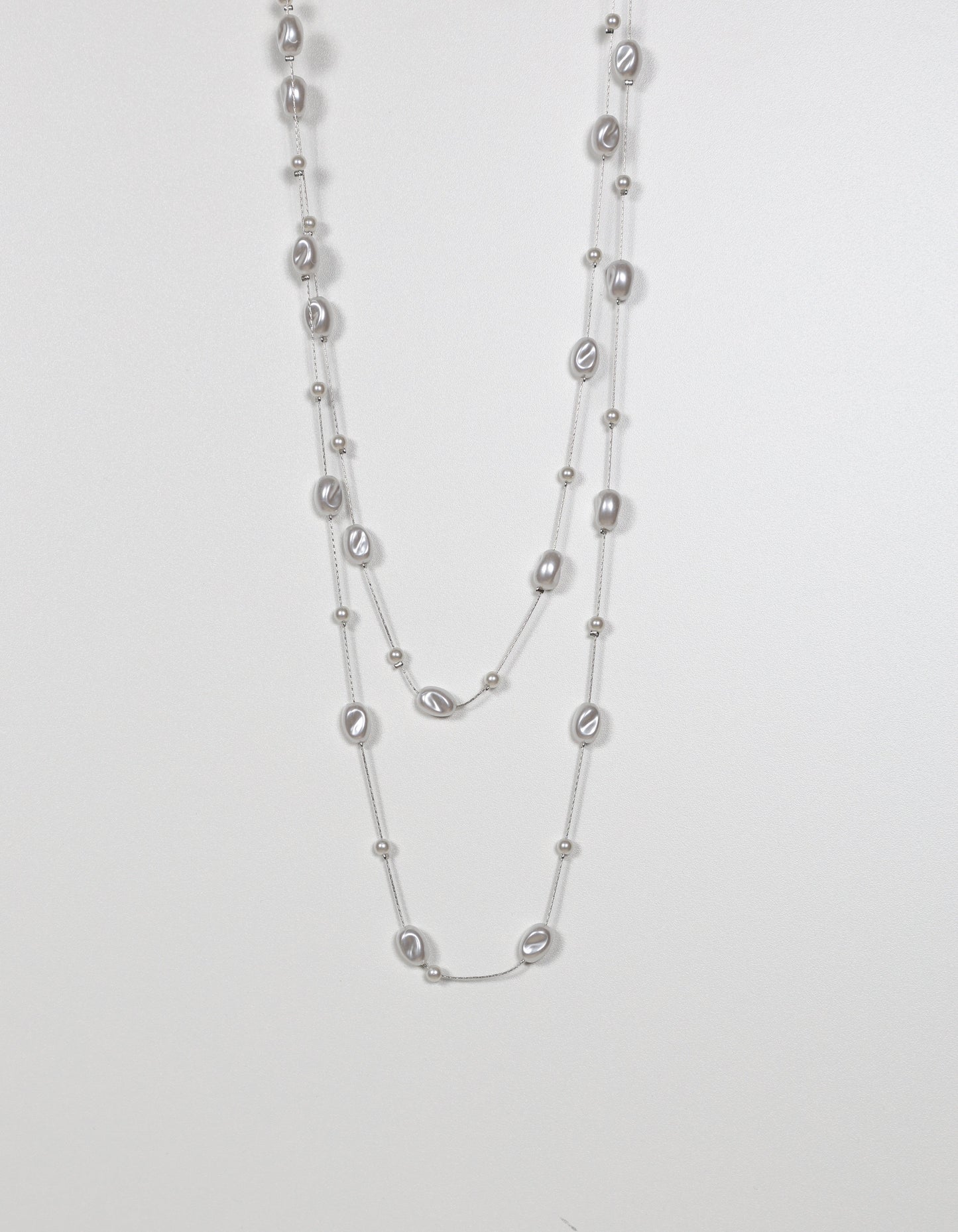 Long Pearl Necklace with Rock-Shaped Accents