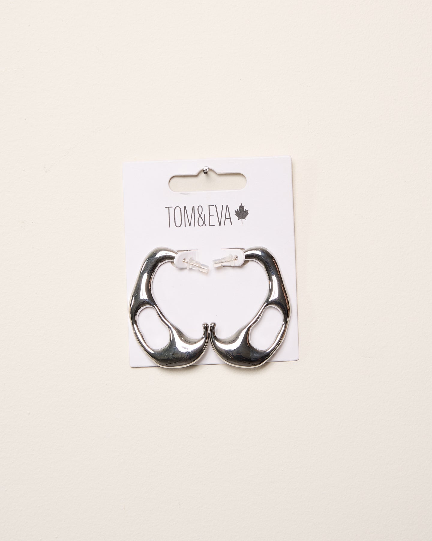 Boucles d’oreilles demi-créoles à forme lave fondue argentée