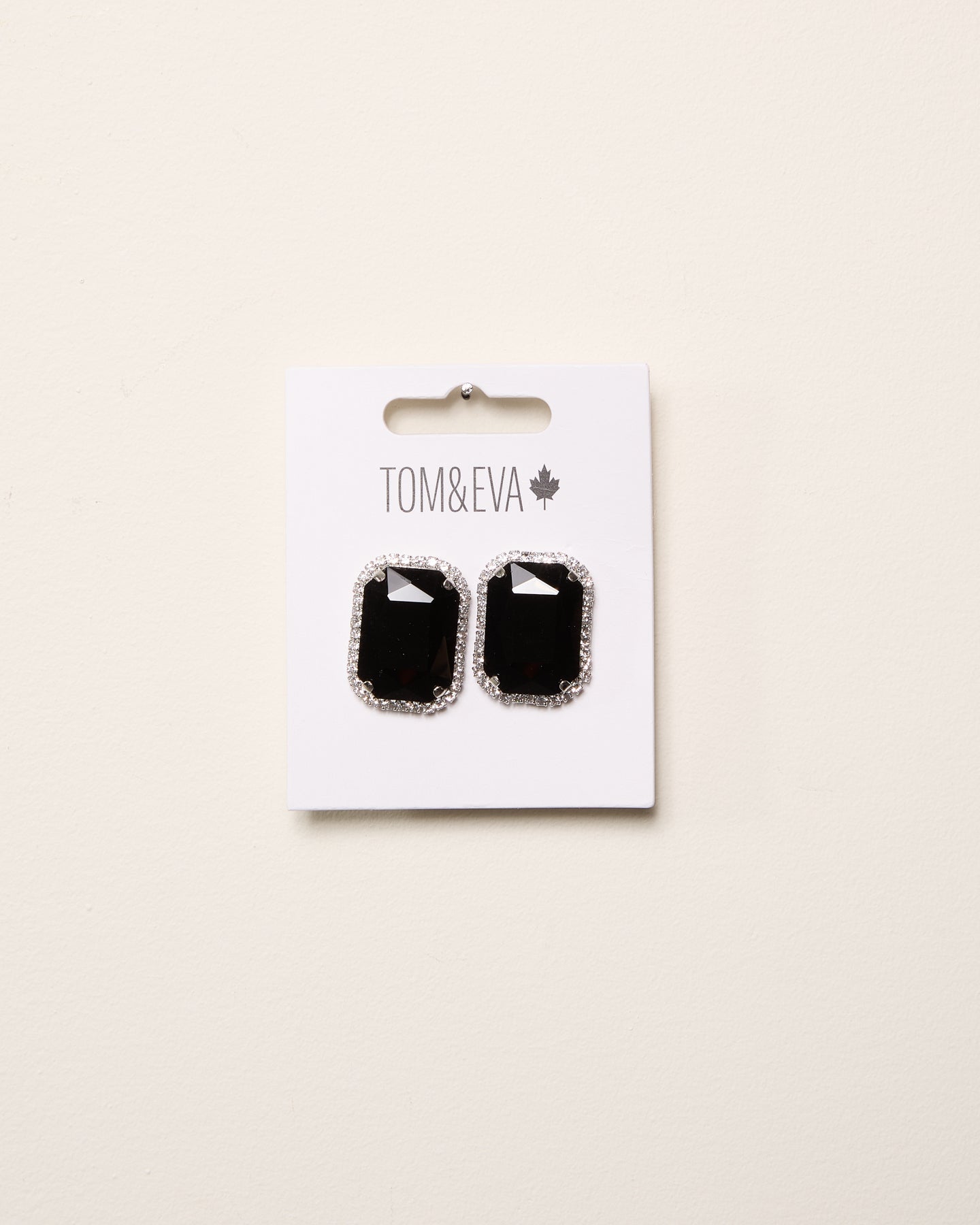 Boucles d’oreilles grande pierre avec bordure de diamants noirs