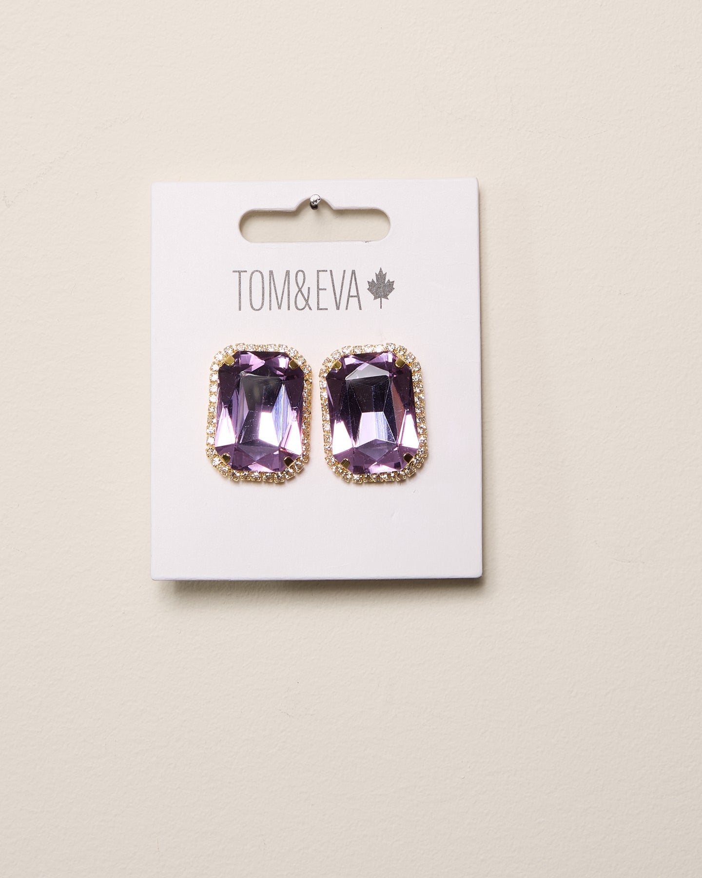 Boucles d’oreilles grande pierre avec bordure de diamants violets