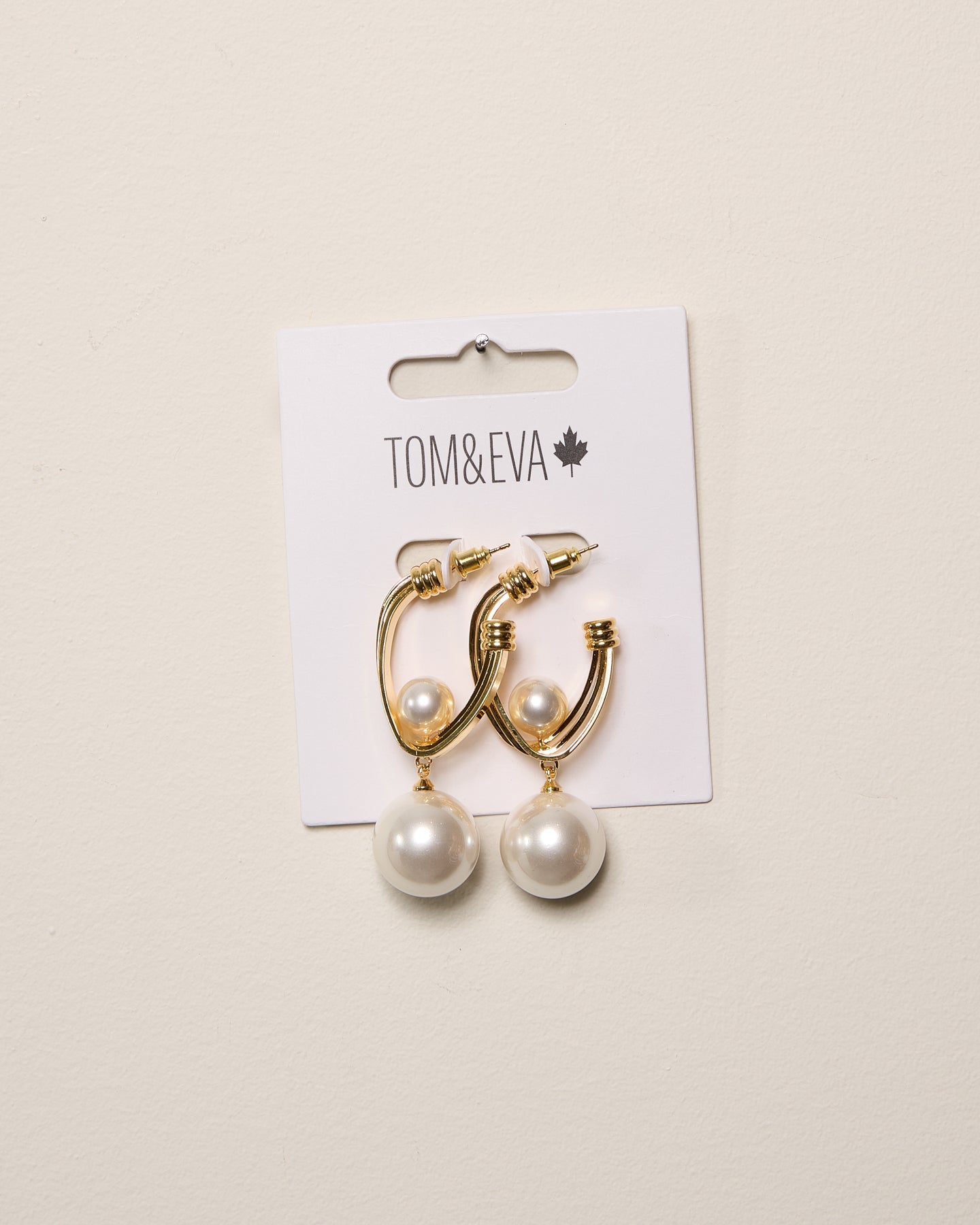 Boucles d’oreilles demi-créoles futuristes avec perles dorées